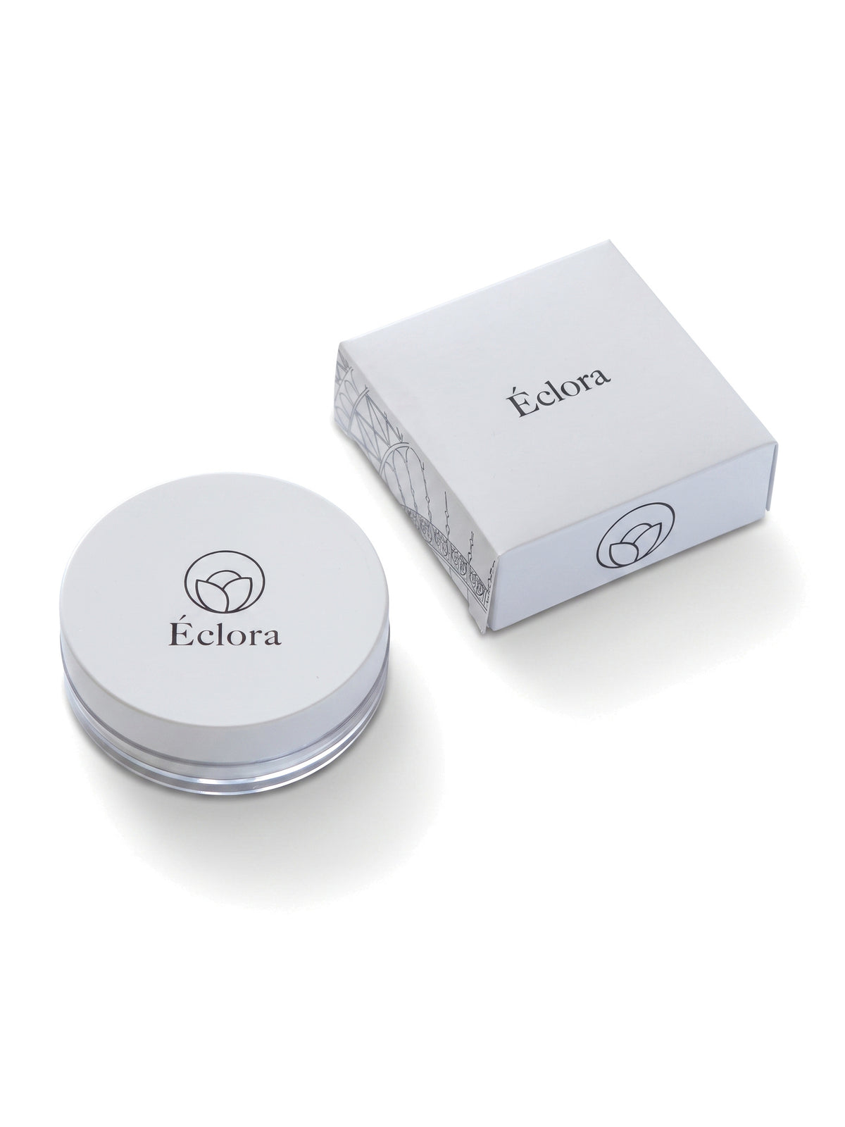 ÉCLORA ルースパウダー 01 の本体と、パリの鉄柵模様をあしらった化粧箱